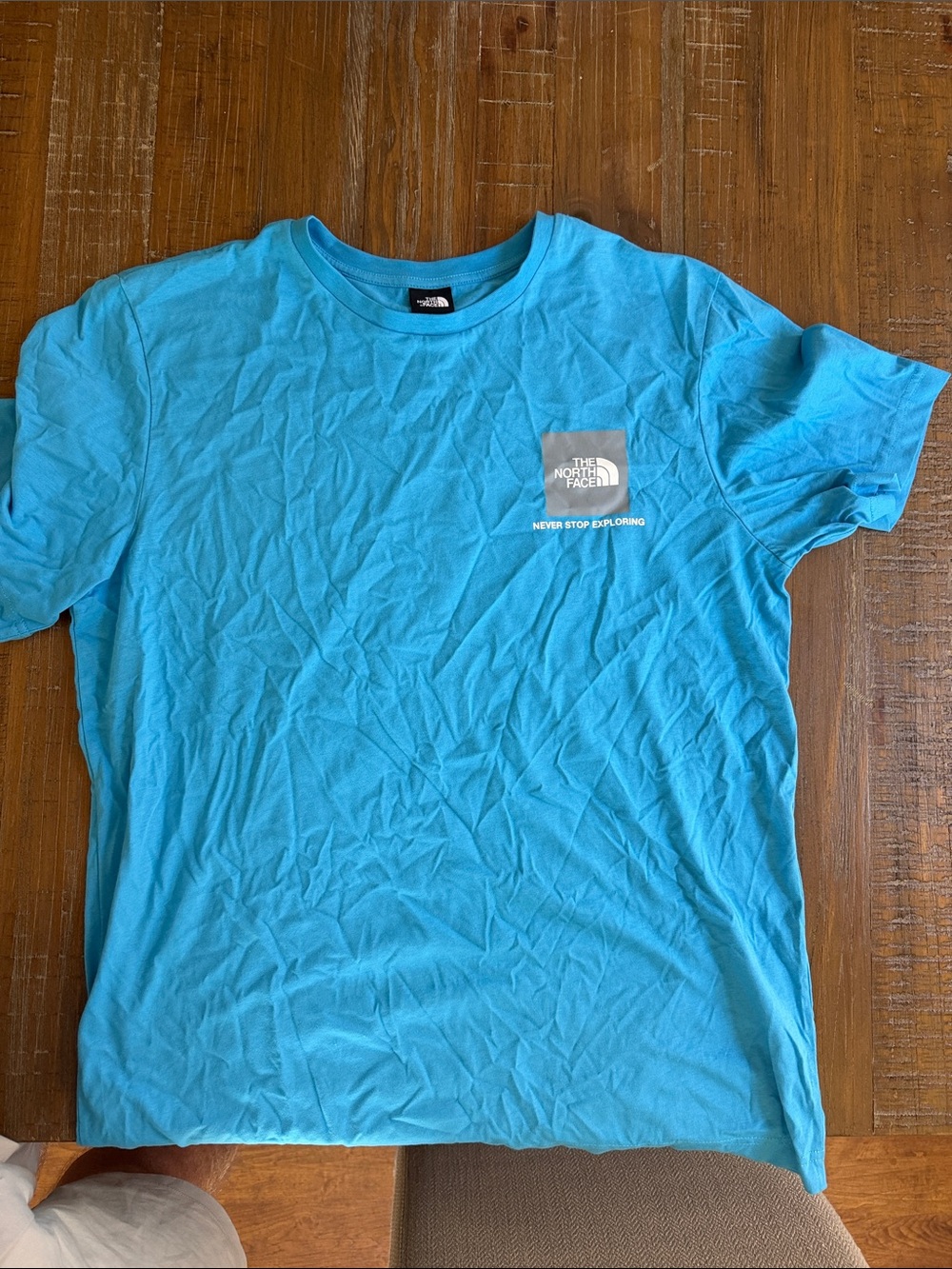 The North Face Men’s Short Sleeve Tee in Aqua Blue with Chest Logo
